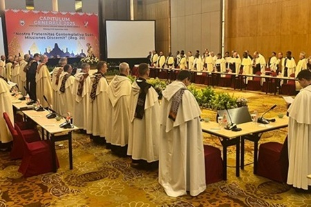 Members assembled in Chapter Hall following the Mass