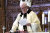 Fr. Míċeál O'Neill reading the Popes letter